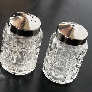 Vintage Elegance Silver Plated and Glass Salt and Pepper Shakers in Holder.