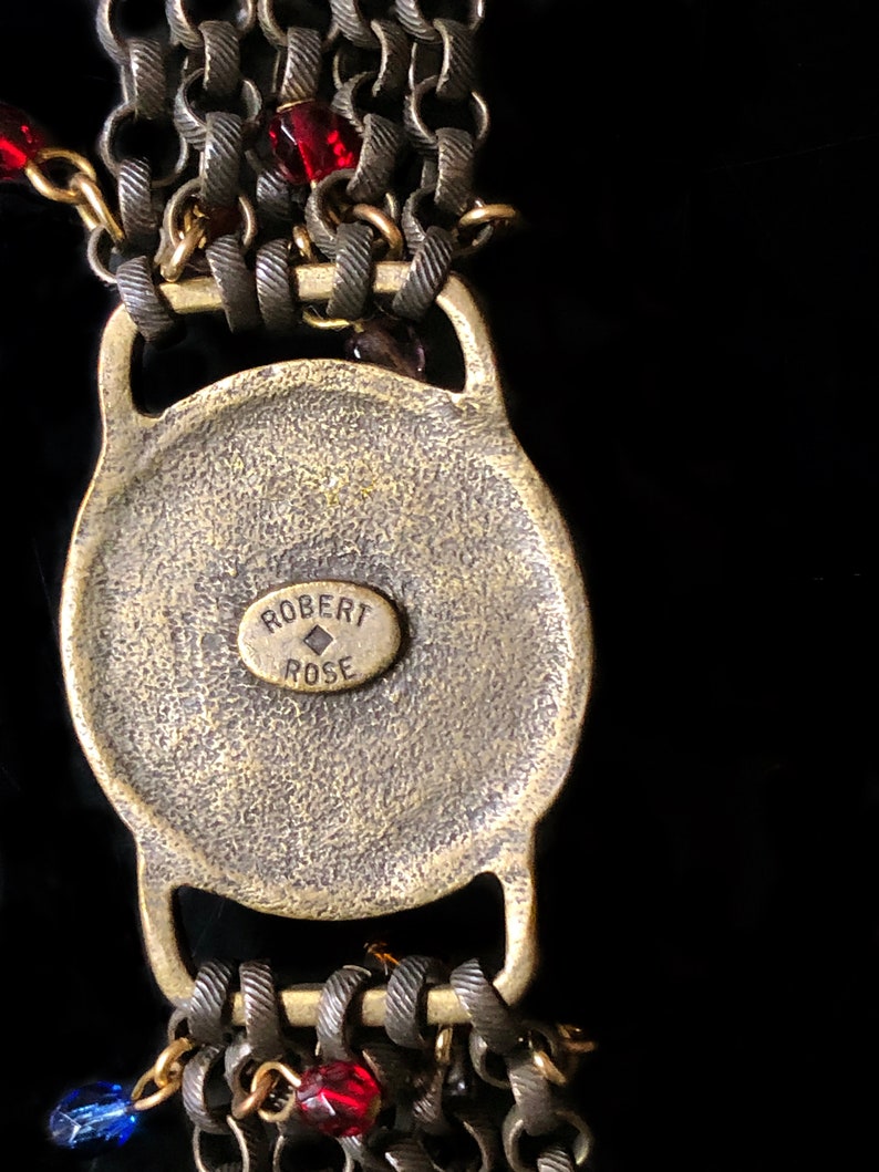 A Robert Rose necklace with matching bracelet.