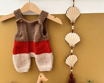 Guirnalda de madera de conchas