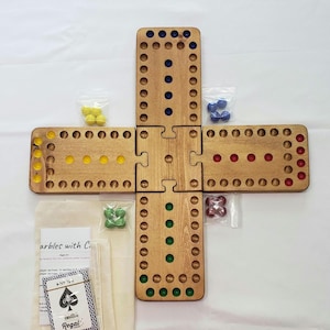Marbles with cards board game 2 3 4 players 7 x 5 hole 16.5 inches across assembled wood with 16mm (5/8&quot;) glass marbles stained golden oak