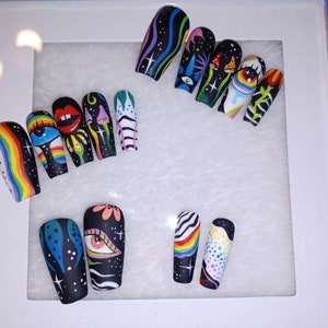 Its a Trip hand painted  full press on nail set