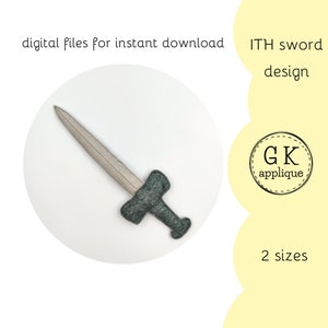 May include: A gray felt sword with a silver blade. The sword is on a white background. The text "ITH sword design" and "GK applique" are visible in the image.