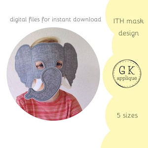 Può includere: Un bambino indossa una maschera di elefante grigia con dettagli bianchi. La maschera è progettata per la ricamo nel cerchio. L'immagine include il testo "ITH mask design" e "GK applique".