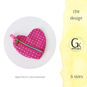 May include: A pink heart-shaped pouch with white polka dots and a colourful zip. The pouch is on a white background. Text on the image reads "ITH design", "digital files for instant download", and "6 sizes". A logo with the letters "Gk" is also visible.