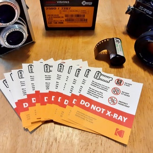 Confezione da 25 adesivi postali Kodak DO NOT X-RAY per la spedizione di pellicole fotografiche, pellicole cinematografiche e carta fotografica