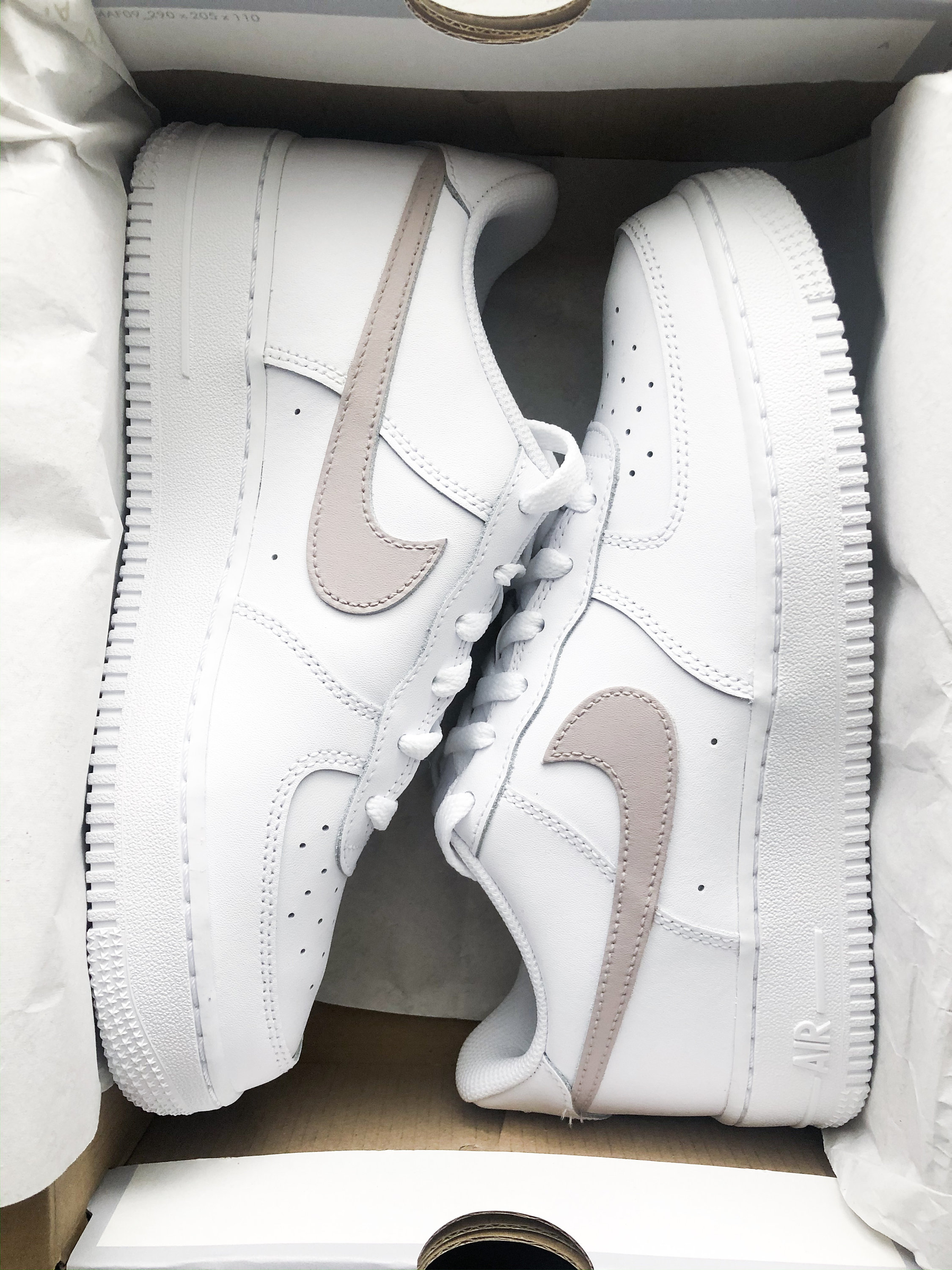 white air forces with colored swoosh