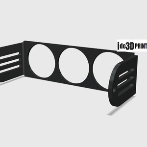 May include: Black plastic gauge pod with three round openings for gauges. The pod has two side brackets with slots for mounting.
