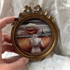 Minikunstprint portret aan zee ingelijst