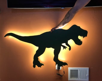 Illuminated TRex silhouette with LED lights. Nightlight