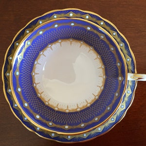Vintage Tuscan Dark Blue and Gold hand decorated wide fine bone china Tea cup with matching Saucer