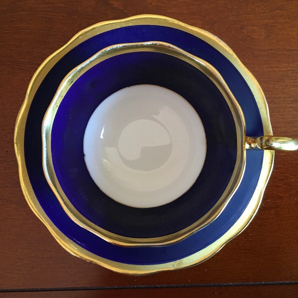 Almost Antique Royal Albert Fine bone china Dark Blue with Gold Doris shape tea cup and Saucer, 1930s