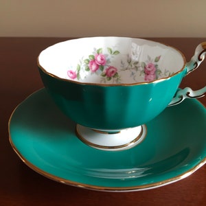 Vintage Green with pink roses Oban shape Aynsley fine bone china Tea cup with saucer
