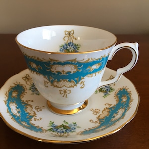 Vintage Queen Anne Blue flowers and Bow  fine bone china Tea cup with matching Saucer Queen Anne Forget Me Not teacup Bridal Gift Blue