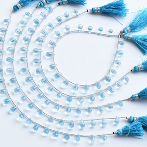 19 stuks blauwe topaas gefacetteerde druppels kralen natuurlijke edelsteen zijboorstreng | 5,5x11 tot 5x8MM | A+ kwaliteit blauwe topaas voor het maken van sieraden