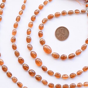 8 Inches Hessonite Garnet Grade-C Smooth Oval Center Drill Natural Gemstone Beads Strand | 11x7x5 to 7x5x3.5 mm | Wholesale Hessonite Beads