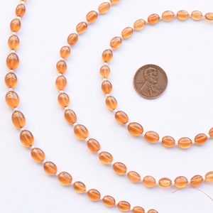 8 Inches Hessonite Garnet Smooth Oval Center Drill Natural Gemstone Beads Strand | 10x7x6 to 5x4x3.5 mm | Wholesale Hessonite Beads