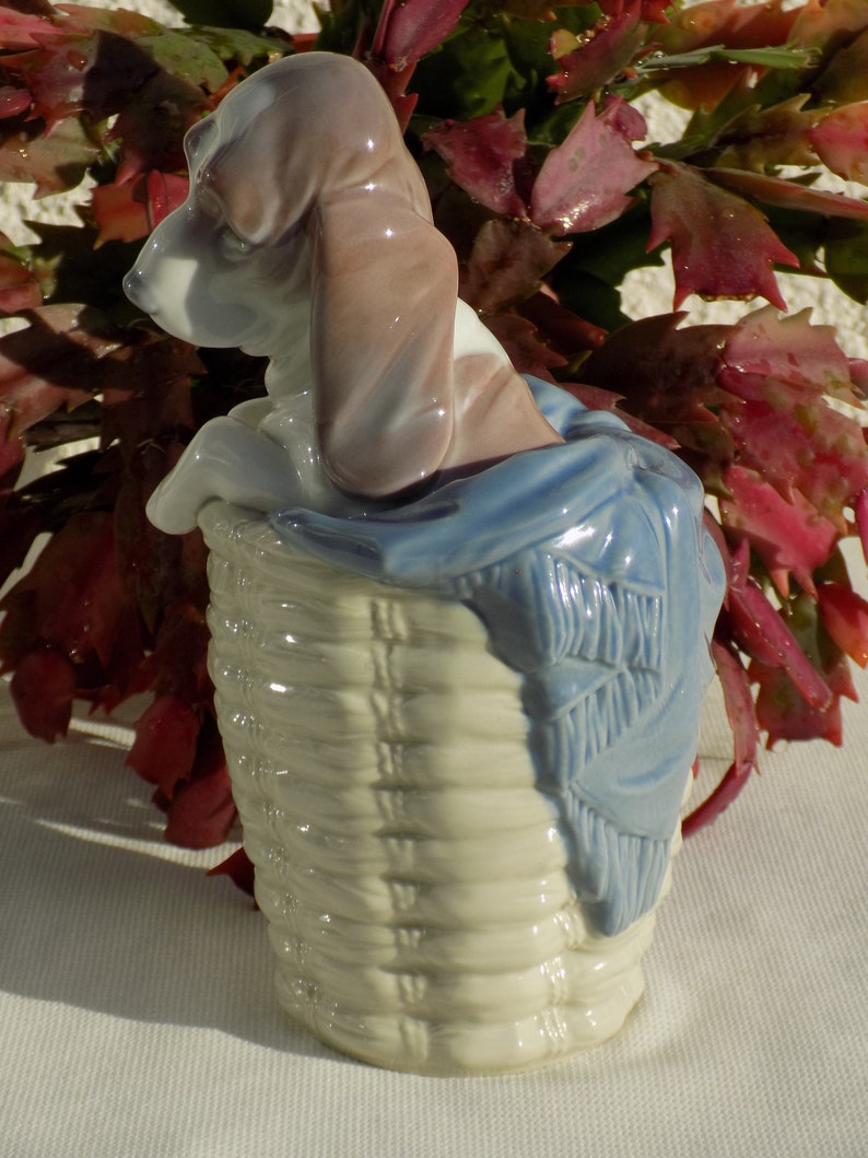 lladro dog and snail