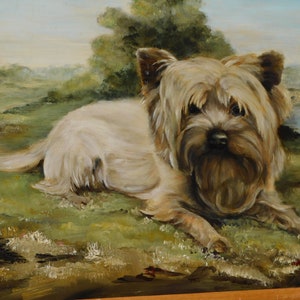 May include: A painting of a small, white dog with brown fur on its face and ears. The dog is lying down on a grassy field with a bridge and trees in the background.