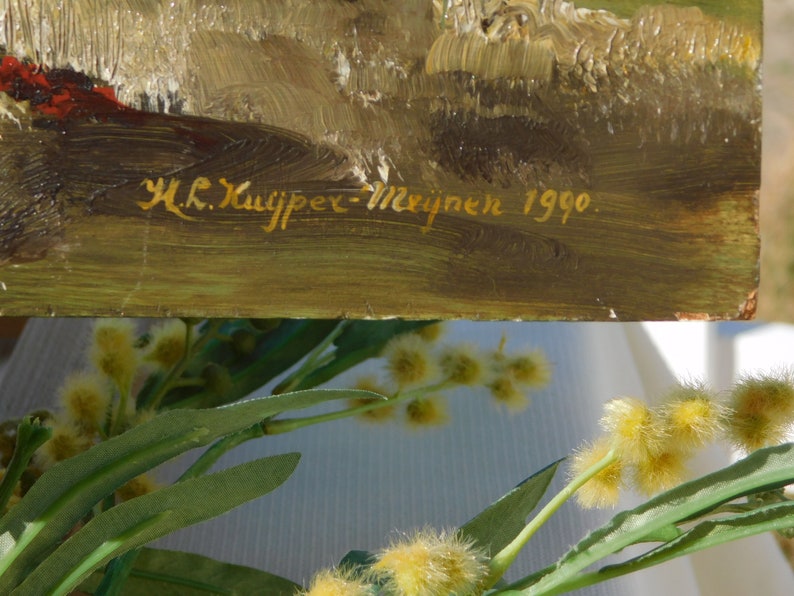 May include: A close-up of a painting with a gold signature that reads "H.K. Kuiper-Meijnen 1990".