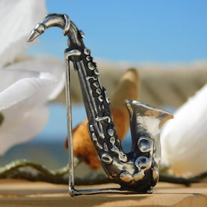 SAXOFÓN. VINTAGE PEWTER Saxophone.Saxofoon.Saxophon.Gelria Tin.Woodwind Instrument.Musical Instrument.Saxofon.Holzblasinstrument.Aerophon!