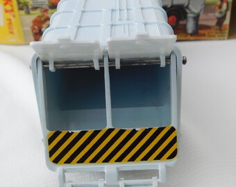 Five Dinky Toys vehicles A.E.C. with flat trailer 915, refuse wagon 978, Atlantean city bus 291, Swi