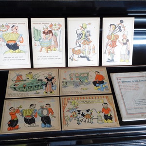 8 PICTURE LIBERATION POSTCARDS.Complete And Unused Set Of 8 Sikko Van Der Woude Cartoon World War 2 Cards.Scarce.Tommies.Dutch Sima Holland!