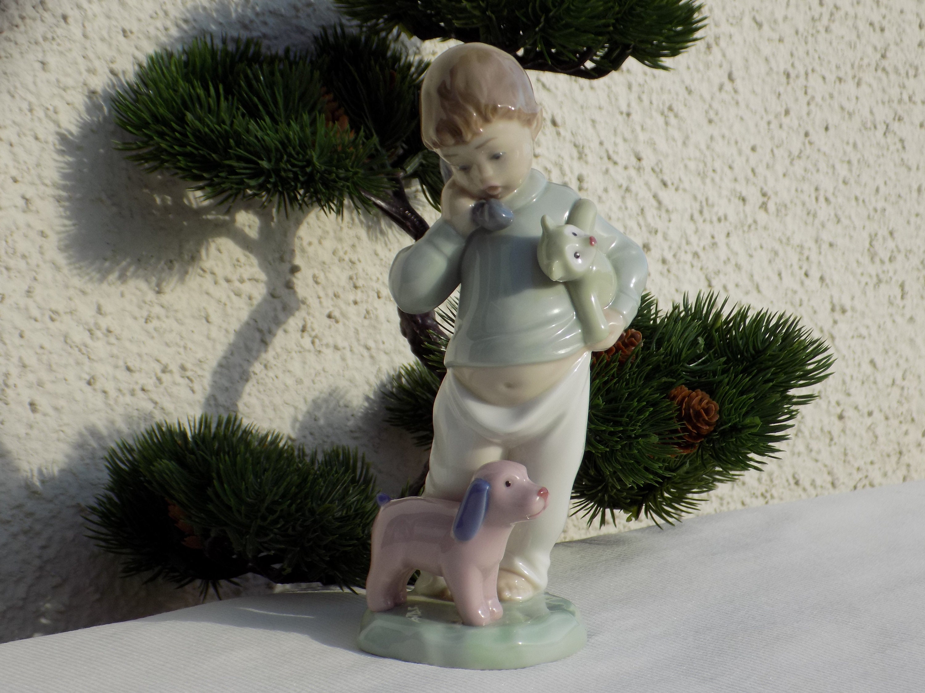 Nao By Lladro 1044 Boy On Phone With Puppets Collectible Nao Etsy