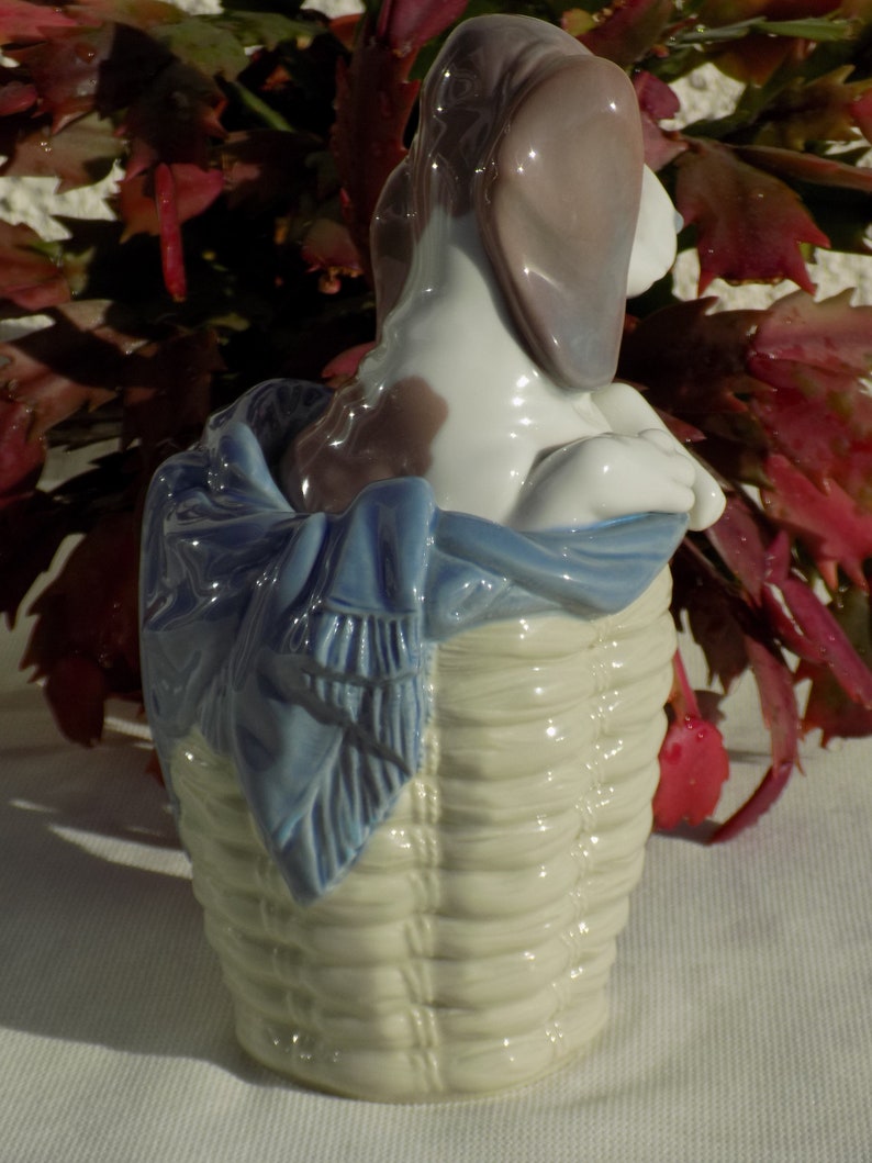 lladro dog and snail