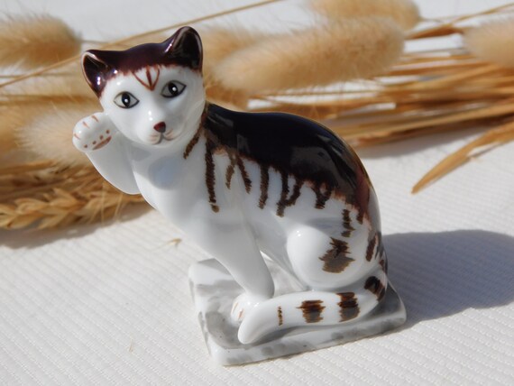 Curio figurines on sale