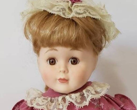 collectible fine bisque porcelain doll