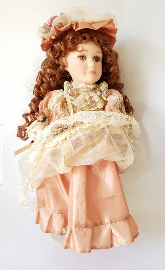 genuine porcelain collectible doll