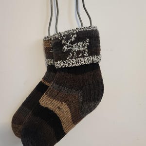 Moose socks are hand-knit in soft varigated  blacks and small amounts of grey yarn—a perfect fit for a man or woman.  Ready to Ship. CANADA