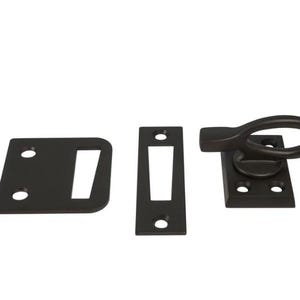 May include: Black metal window latch with a loop handle. The latch has two plates, one with a slot and the other with a rectangular opening.