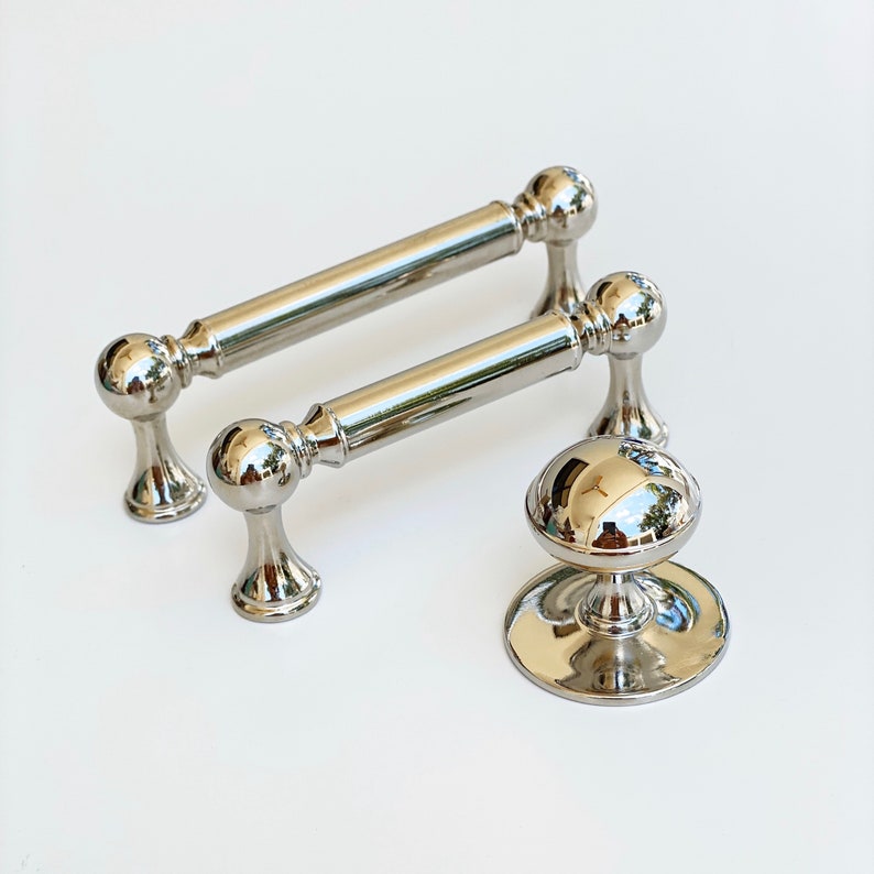 Polished Nickel Transitional "Queen" Cabinet Knob and Pulls