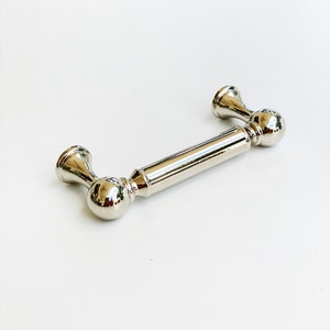 Polished Nickel Transitional "Queen" Cabinet Knob and Pulls