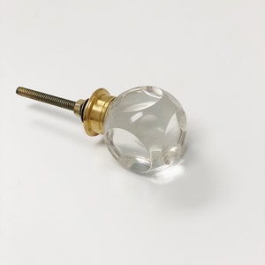 Clear Glass Cabinet Knob with Brass Base.