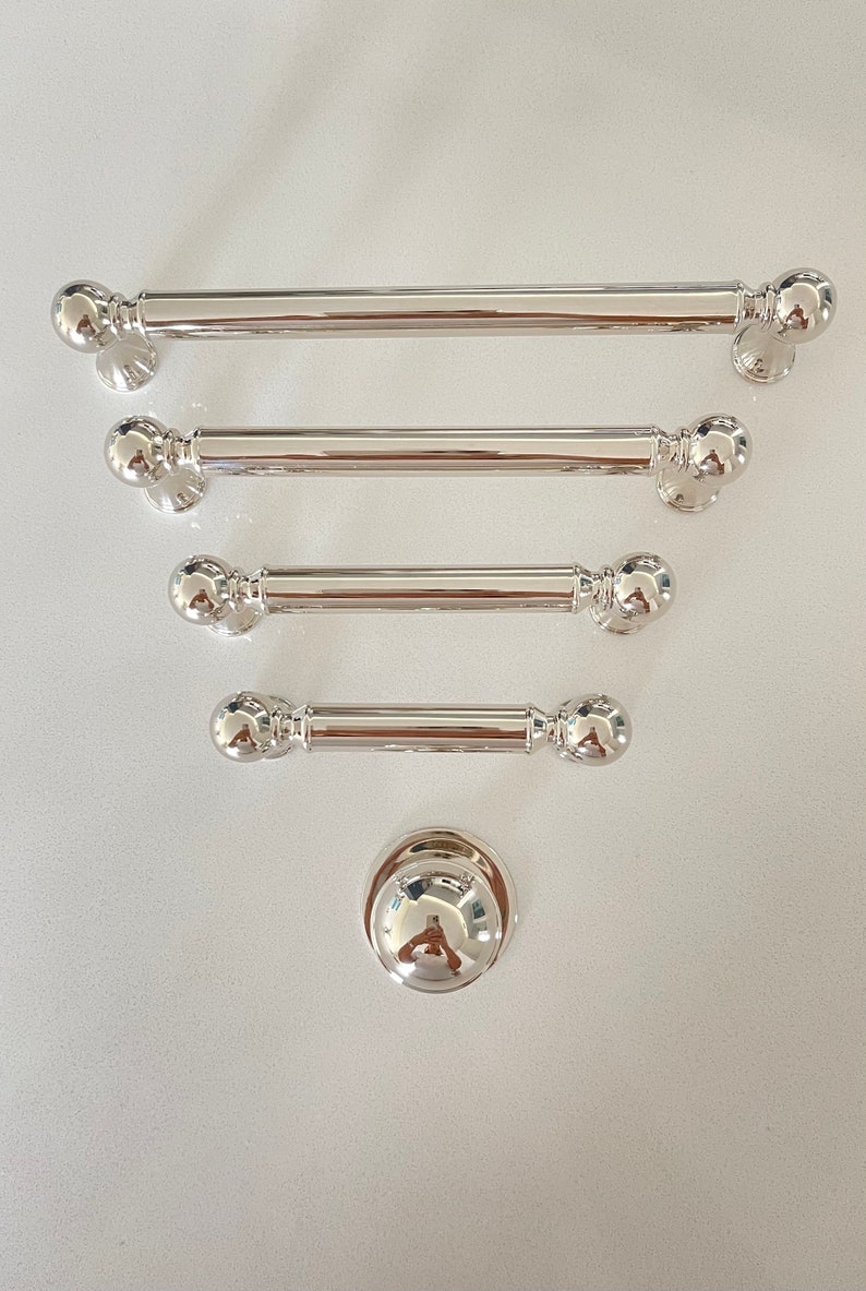 Polished Nickel Transitional "Queen" Cabinet Knob and Pulls