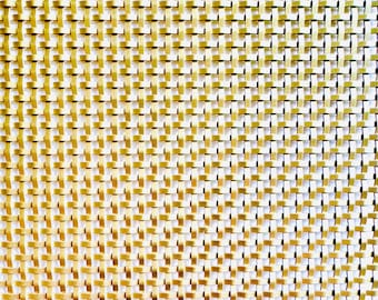 May include: A close-up of a woven metal mesh with a gold and white pattern. The mesh is made of thin metal wires that are woven together to create a grid-like pattern.