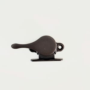 May include: A brown window sash lock with a lever handle. The lock is designed to be mounted on a window sash.