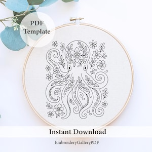 May include: A black and white octopus embroidery design with floral accents, displayed in a wooden hoop. The design includes the text "PDF Template" and "Instant Download". The Etsy shop name "EmbroideryGalleryPDF" is also visible.