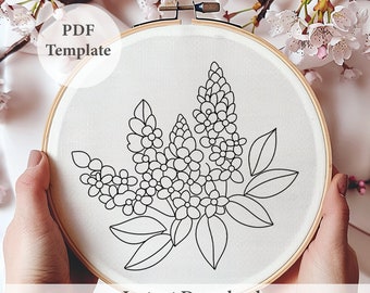 ライラックの枝の手刺繍パターン、紫のライラックの花、ピンクの