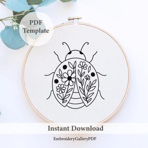 May include: A black and white ladybird embroidery design on white fabric, held in a wooden hoop. The ladybird's wings feature floral patterns. Text on the image reads "PDF Template" and "Instant Download".