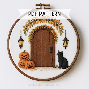 May include: An embroidery hoop featuring a fall-themed design. A brown wooden door is framed by autumn leaves, with jack-o'-lanterns, lanterns, and a black cat. The text "PDF PATTERN" is displayed across the top.