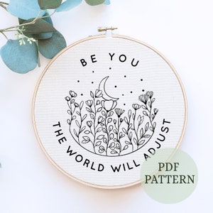 May include: Black and white embroidery hoop with the text "Be you the world will adjust" and a crescent moon with stars and flowers.