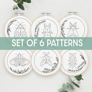 May include: Set of six embroidery patterns featuring various insects, including moths, beetles, and a dragonfly. Each pattern is framed in a circular hoop with a floral design.