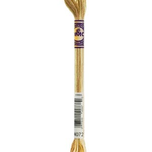 May include: A single skein of DMC embroidery floss in a light beige color. The floss is wrapped around a cardboard label with the DMC logo and color information. The color code 4072 is visible on the label.