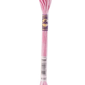 May include: A single skein of pink embroidery floss, with a label that reads "Mouliné Spécial DMC". The floss is a light pink color, with a twisted thread design. The label has the number "4180" printed on it.