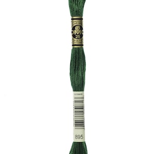 May include: A spool of DMC embroidery floss in color 895, a dark green. The spool is labeled with the DMC logo and the number 895.