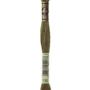 May include: A spool of DMC embroidery floss in colour 730, a muted olive green. The spool is labelled with the DMC logo and the colour number.