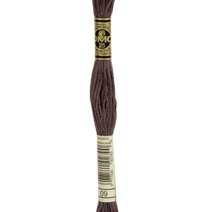 May include: A skein of DMC embroidery floss in color 09, a deep purple shade. The floss is wound around a cardboard spool with a gold label that reads "DMC" and "25m (8.7 yd)".
